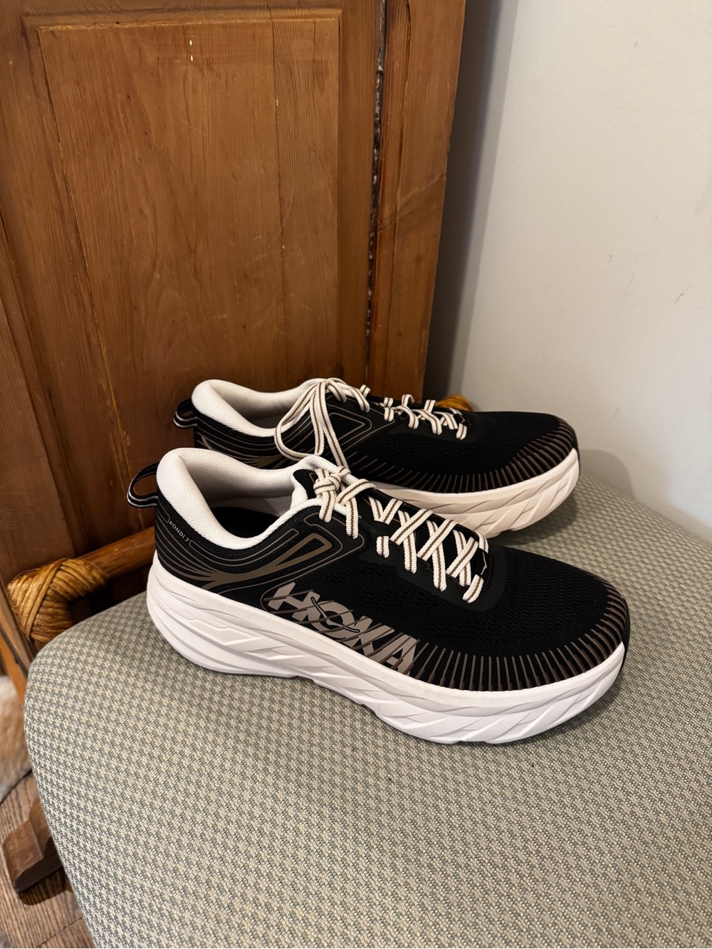 Women’s Black and White Hokas Performance Running Shoes